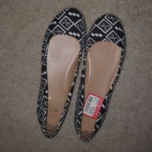 New, never worn black/white flats